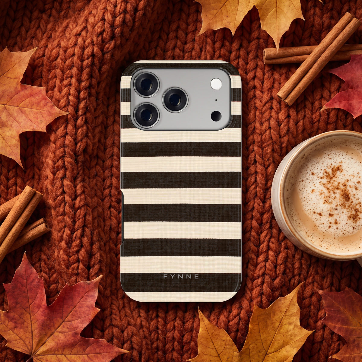 Espresso Streepjes hoesje op een iPhone 17 Pro, uit The Fall Collection