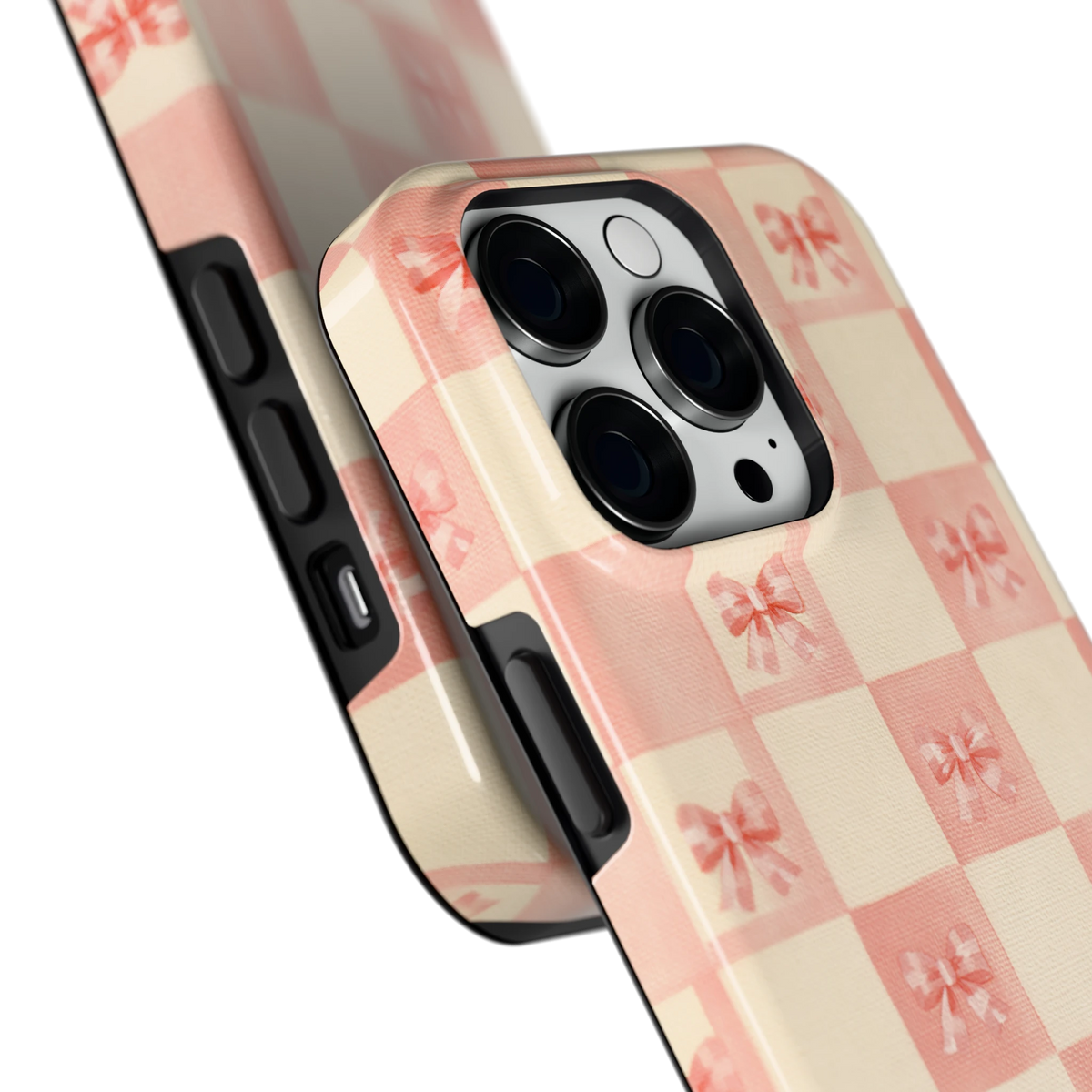 Roze strikjesgeruit hoesje voor iPhone 14 Pro, close-up