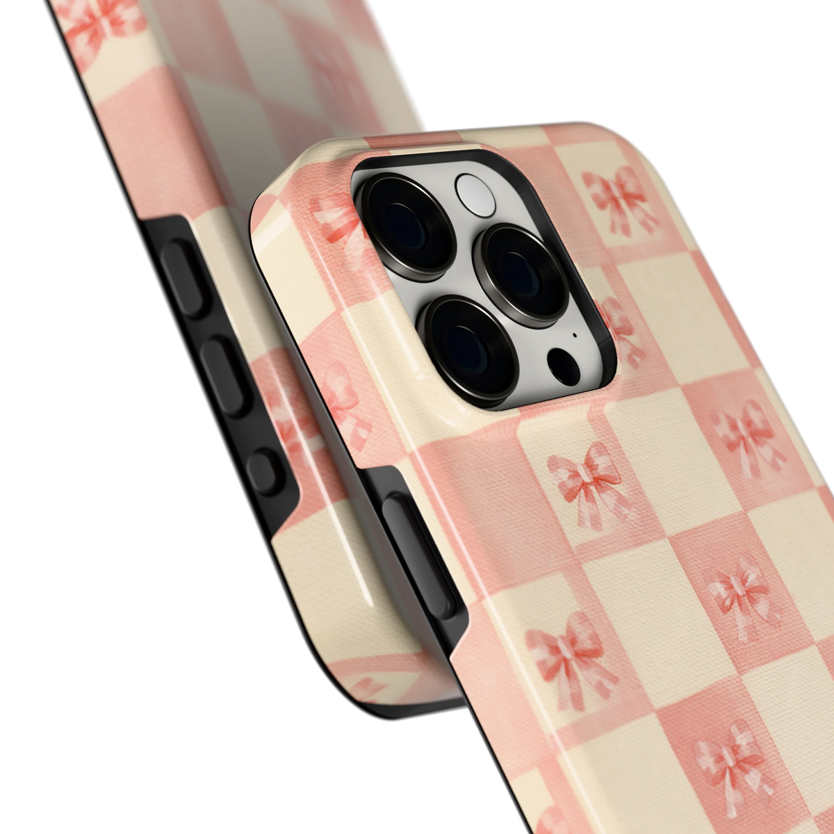 Roze strikjesgeruit hoesje voor iPhone 15 Pro Max, close-up