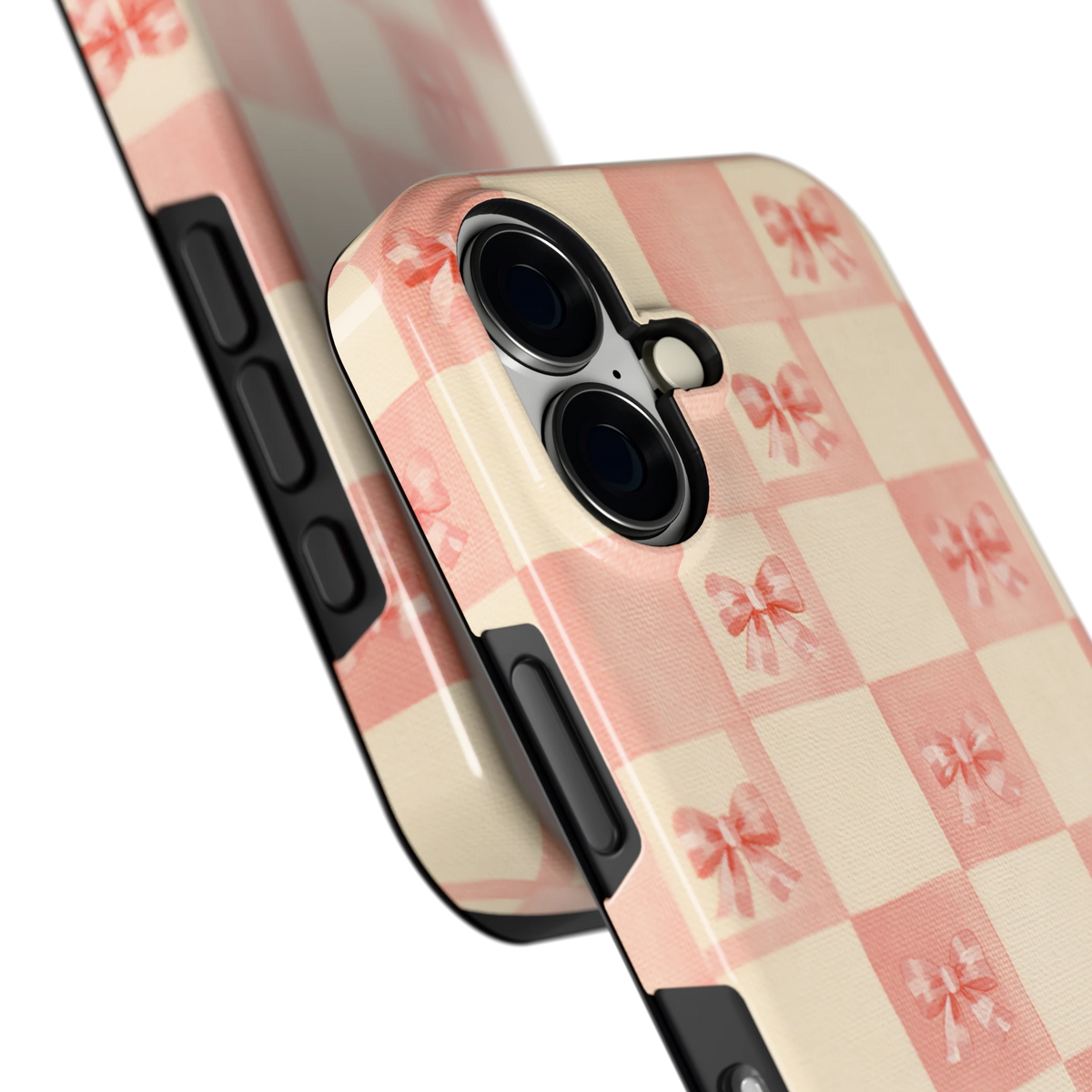 Roze strikjesgeruit hoesje voor iPhone 16, close-up