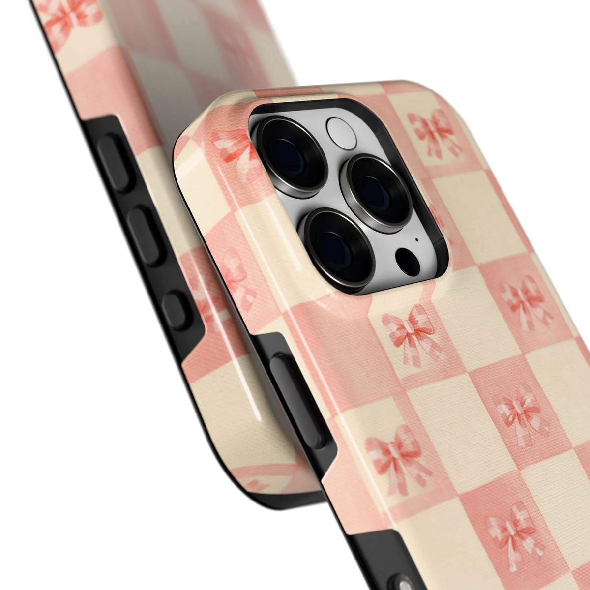 Roze strikjesgeruit hoesje voor iPhone 16 Pro, close-up