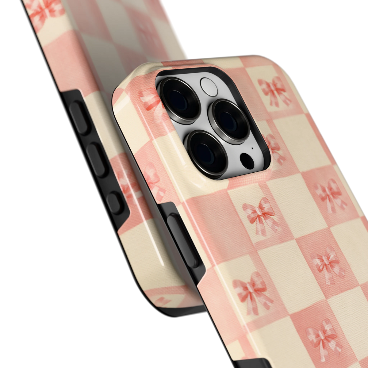 Roze strikjesgeruit hoesje voor iPhone 16 Pro Max, close-up
