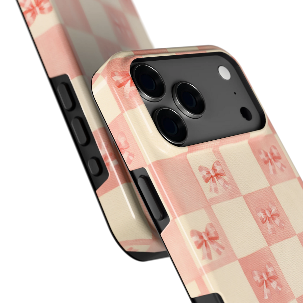 Roze strikjesgeruit hoesje voor iPhone 17 Pro Max, close-up