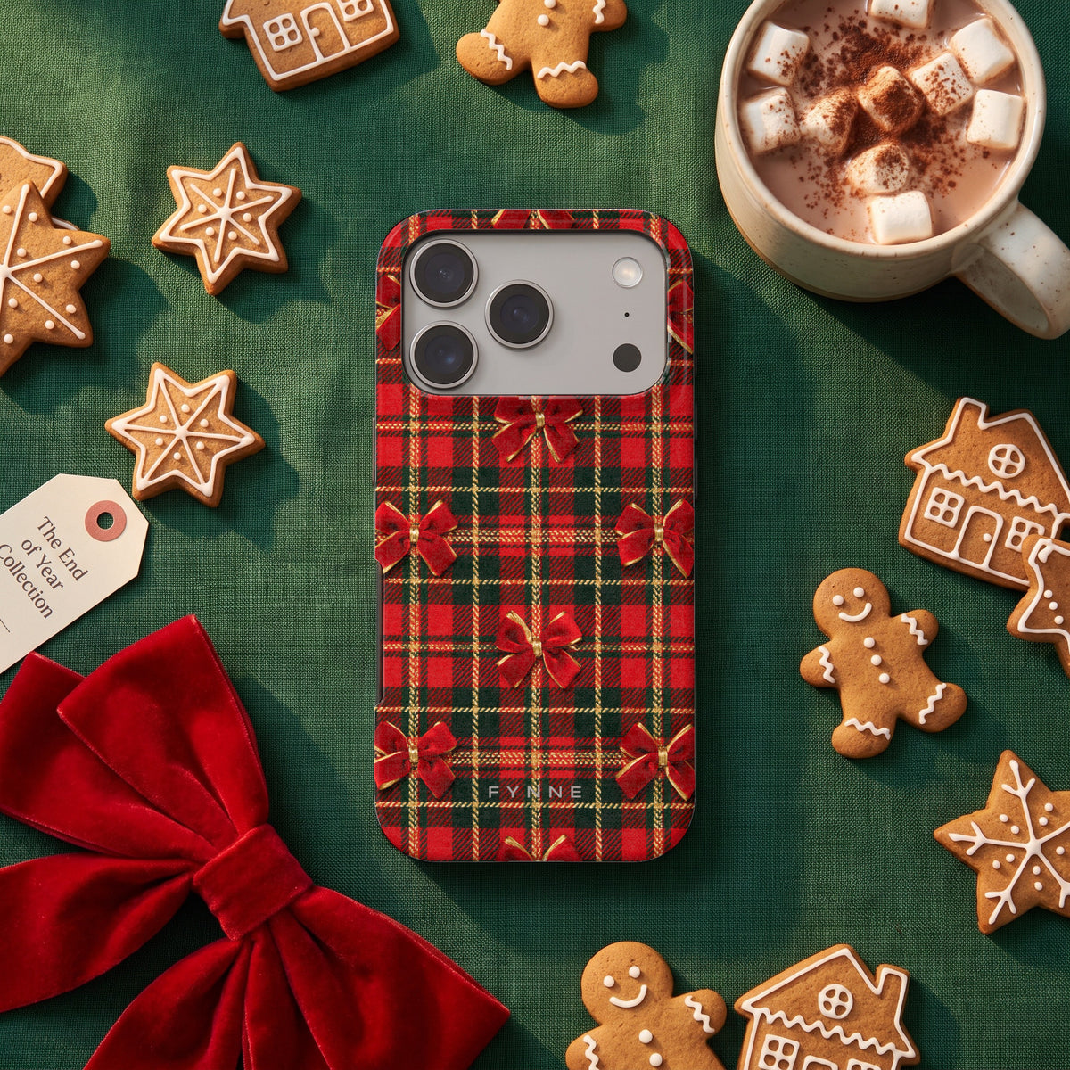 Tartan strikjes hoesje op een iPhone 17 Pro, uit The End of Year Collection
