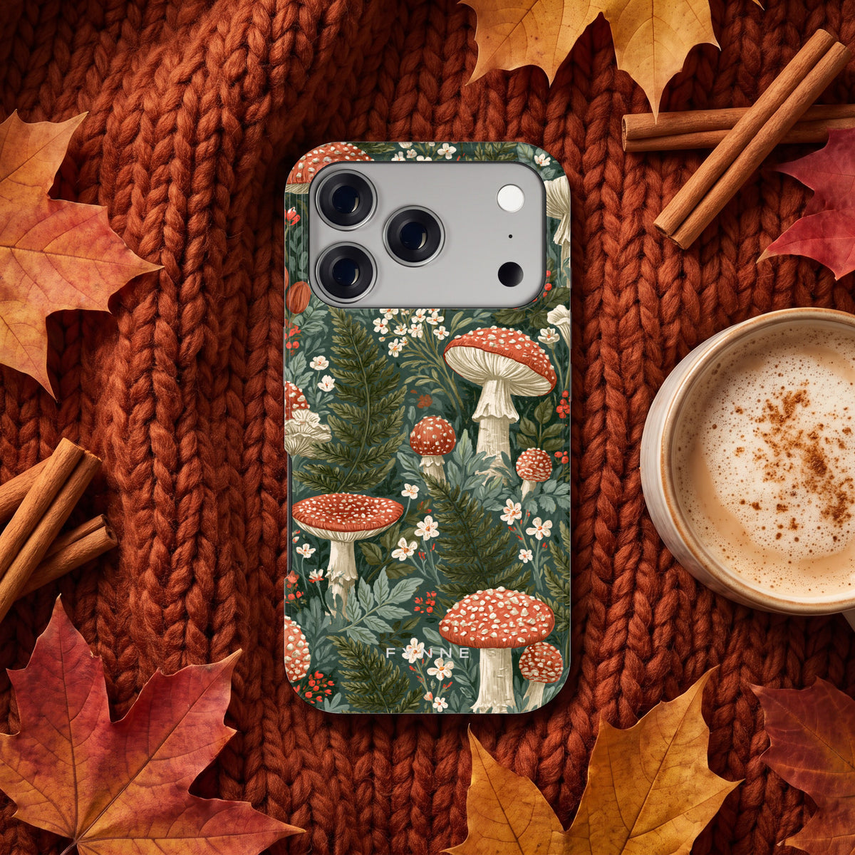 Vliegenzwammenbos hoesje op een iPhone 17 Pro, uit The Fall Collection